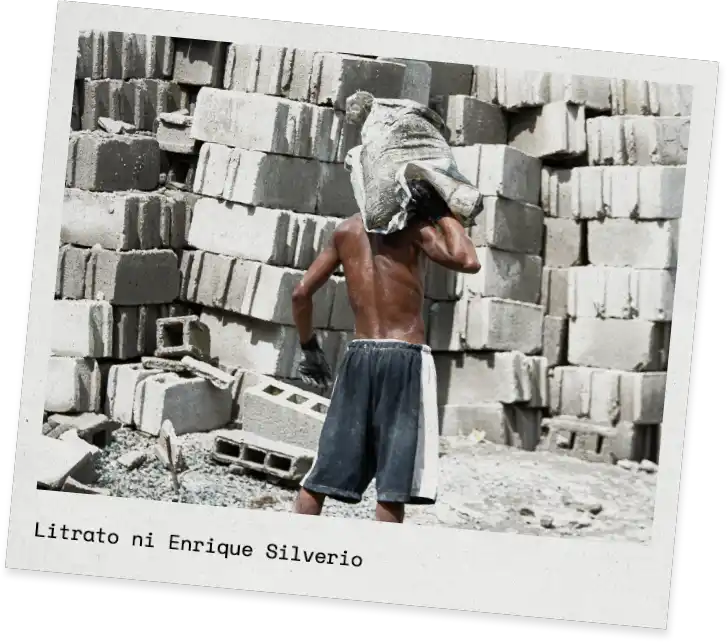 Construction worker holding a cement bag